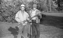 William Dickerson and Clemmon Brown with antique rifle