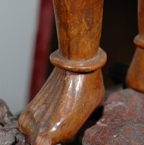 Chipped toe of Attendant figure of the Sculpture