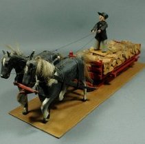 Folk Art Carving of a Horse-Drawn Wood Wagon