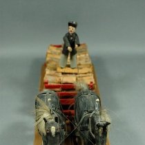 Folk Art Carving of a Horse-Drawn Wood Wagon