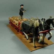 Folk Art Carving of a Horse-Drawn Wood Wagon