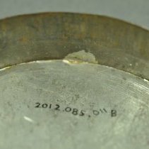 Catalogue number on interior of the Lid (B)