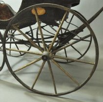 Carriage, Baby - Rear left wheel