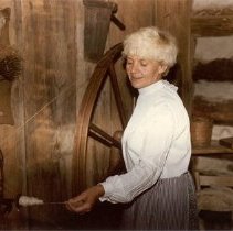 Lillian Langhammer demonstrating the walking wheel (1970s)