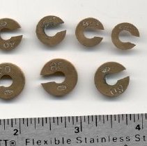 Brass weights from the Sikes Hydrometer set