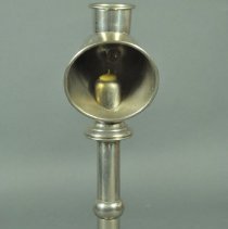 Candleholder with a Reflector