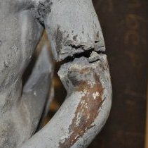 Damage detail on left elbow