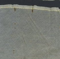 View of stain damage on long edge
