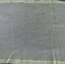 View of stain damage on long edge