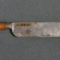 Close up under side view of (d)