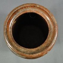 Top side view of jar (a)