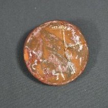 Under side view of lid (b)