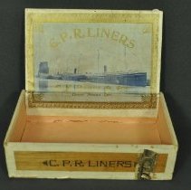 Box shown open with interior label