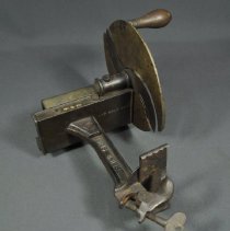 Lying down, showing maker's stamp