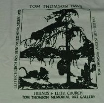 Close up on the graphic and text on the front of the shirt.