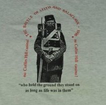 Close up of the text and graphic on the front of the shirt.