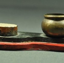 Side, holder to right