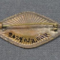 Back of pin