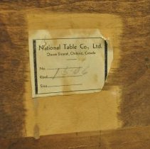 Maker's label on back of sideboard (a)
