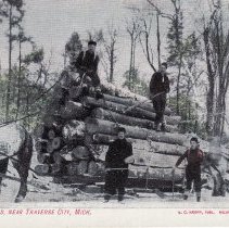 Men with Logs