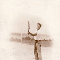 Man playing tennis