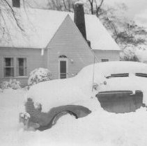 Car covered in snow