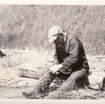 Oscar Price mending nets