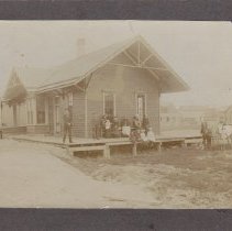 R.R. station with people and horse team