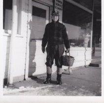 Unidentified man with basket
