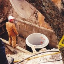 Leland sewer project - worker in trench