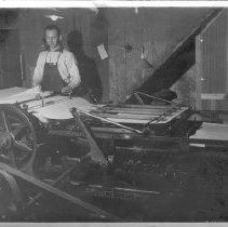 Wilfred Peters at paper folder