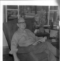 Man Reading in Chair