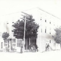 Stores with people and horses