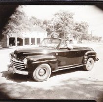 Smiling Man in Convertible