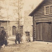 Log and Stone Home in Northpoint (Northport, Michigan) with Pink Door