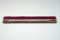 Kasse med termometer åben