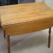 Table with leaves down.