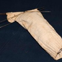 Cotton socks on a knitting needle