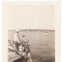 Dana H.N. Mayo and son Dana W. Mayo on Horner's dock