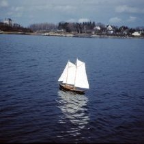 Andrew White with toy sailboat
