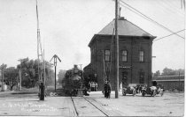 C. & N.W. Depot and train on DeKalb Avenue