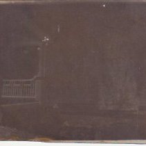 Glass negative, side of porch at 29 Main St