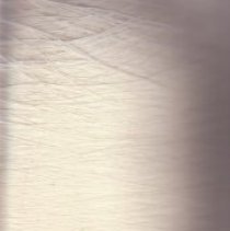 Abbot Worsted cream yarn on a cylinder