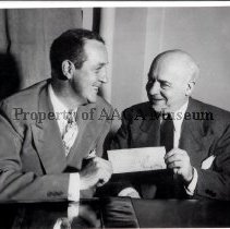 Preston Tucker receives a check