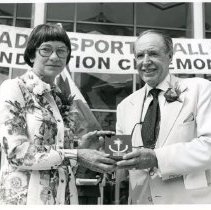 Harry Foster posing with Canada's Sports Hall of Fame Inductee Award, 1976