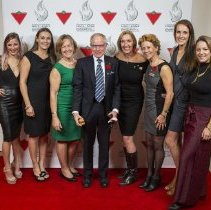 Group photo with inductee Sue Hollway, family and Hall of Famers