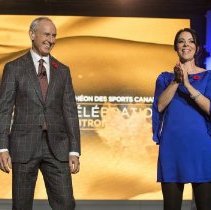 Event MC's Ron MacLean & Tara Slone onstage