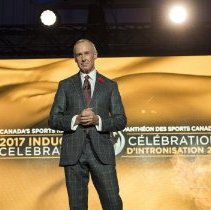 MC Ron MacLean onstage during 2017 induction ceremony