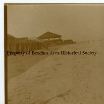 Beach scene with pavilion