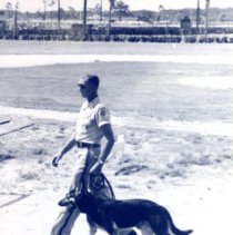 Policeman with K-9, undated